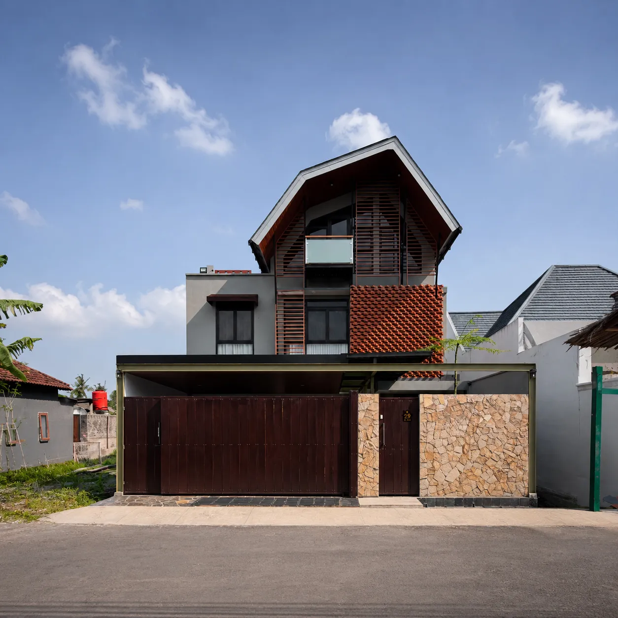 The Brick Gable Facade and Assymmetric Vernacular Roof